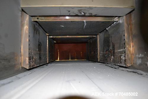 Used Great Lakes Shrink Tunnel, Model HVD-12-22-90-HP, Carbon Steel. Approximate 19’’ wide x 122’’ long solid belt, driven by a 1/2hp, 90 volt DC gear motor. Tunnel opening 25’’ wide x 17’’ tall x 90...