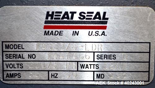 Used Heatseal Turbo Shrink Tunnel, Model T4822/8-LDR, Carbon Steel. 48" Long shrink area. Infeed/discharge opening 22" wide x 8" high. 18" wide x 70" long Teflon mesh conveyor, driven by a 1/8 hp, 13...