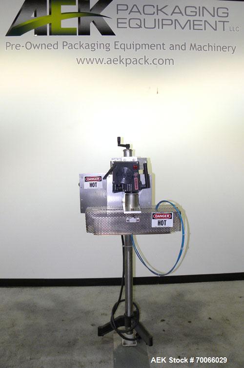 Used Kalish Neck Bander Shrink Tunnel, 3’’ wide x 18’’ long. Includes a Leister hot air blower, model Hotwind S. Maximum air outlet temperature 650 deg C. The Leister is a compact heat gun for proces...