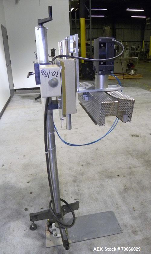 Used Kalish Neck Bander Shrink Tunnel, 3’’ wide x 18’’ long. Includes a Leister hot air blower, model Hotwind S. Maximum air outlet temperature 650 deg C. The Leister is a compact heat gun for proces...