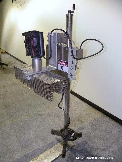 Used Kalish Neck Bander Shrink Tunnel, 4’’ wide x 18’’ long. Includes a Leister hot air blower, model Hotwind S. Maximum air outlet temperature 650 deg C. The Leister is a compact heat gun for proces...