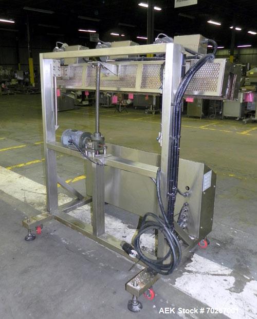 Used NAFM Heat Shrink Tunnel, Model GS-100T, Stainless Steel. Approximate 5’’ wide x 68’’ long heat section, (3) top mounted blowers. 1/2hp Gear motor raise and lower. Mounted on a stainless steel fr...