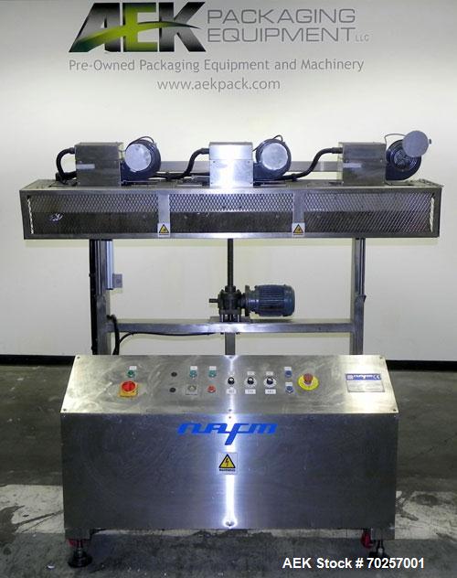 Used NAFM Heat Shrink Tunnel, Model GS-100T, Stainless Steel. Approximate 5’’ wide x 68’’ long heat section, (3) top mounted blowers. 1/2hp Gear motor raise and lower. Mounted on a stainless steel fr...
