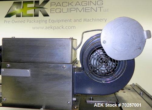 Used NAFM Heat Shrink Tunnel, Model GS-100T, Stainless Steel. Approximate 5’’ wide x 68’’ long heat section, (3) top mounted blowers. 1/2hp Gear motor raise and lower. Mounted on a stainless steel fr...