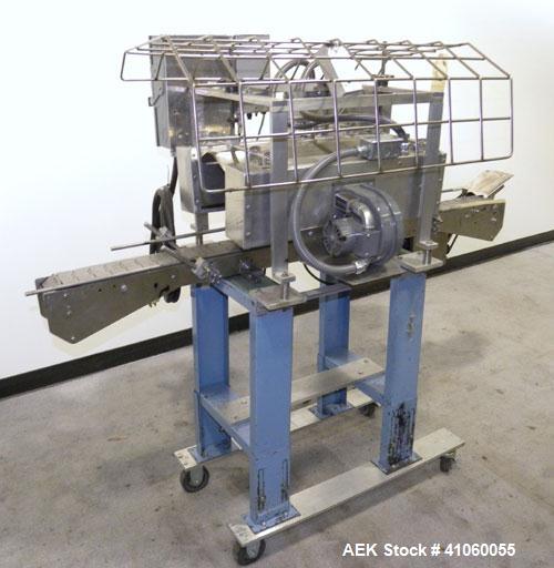Used Gilbreth Heat Tunnel, Model 7102	TC. 230 volt, 25" long heat tunnel, (2) side mounted fans. Mounted on top of a 3’’ wide x 58’’ long belt conveyor, driven by an approximate 1/3 hp motor with a s...