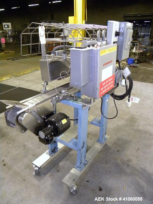 Used Gilbreth Heat Tunnel, Model 7102	TC. 230 volt, 25" long heat tunnel, (2) side mounted fans. Mounted on top of a 3’’ wide x 58’’ long belt conveyor, driven by an approximate 1/3 hp motor with a s...