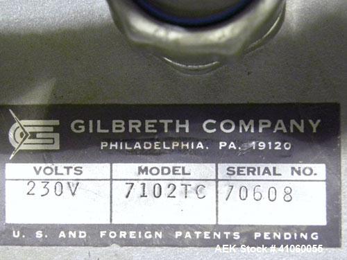 Used Gilbreth Heat Tunnel, Model 7102	TC. 230 volt, 25" long heat tunnel, (2) side mounted fans. Mounted on top of a 3’’ wide x 58’’ long belt conveyor, driven by an approximate 1/3 hp motor with a s...