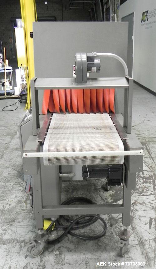 Used Omega Model SL18 Shrink Bundling System with Integrated Shrink Tunnel. Capable of up to 15-20 cycles per minute. Right angle product infeed for 4-1/2”W table top chain, infeed conveyor not inclu...