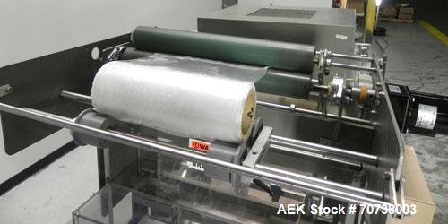 Used Omega Model SL18 Shrink Bundling System with Integrated Shrink Tunnel. Capable of up to 15-20 cycles per minute. Right angle product infeed for 4-1/2”W table top chain, infeed conveyor not inclu...