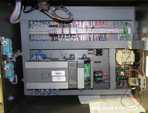 Used Omega Model SL18 Shrink Bundling System with Integrated Shrink Tunnel. Capable of up to 15-20 cycles per minute. Right angle product infeed for 4-1/2”W table top chain, infeed conveyor not inclu...
