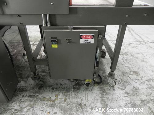 Used Omega Model SL18 Shrink Bundling System with Integrated Shrink Tunnel. Capable of up to 15-20 cycles per minute. Right angle product infeed for 4-1/2”W table top chain, infeed conveyor not inclu...
