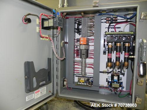 Used Omega Model SL18 Shrink Bundling System with Integrated Shrink Tunnel. Capable of up to 15-20 cycles per minute. Right angle product infeed for 4-1/2”W table top chain, infeed conveyor not inclu...