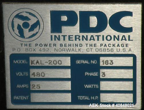 Used PDC Heat Tunnel for Temper Evident Bands, Model KRC123654. 12,000 watts, 36" long heat tunnel, (2) top mounted fans, motorized raise and lower, model KAL-200 control panel, serial #163. Athena d...