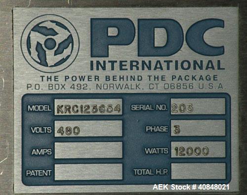 Used PDC Heat Tunnel for Temper Evident Bands, Model KRC123654. 12,000 watts, 36" long heat tunnel, (2) top mounted fans, motorized raise and lower, model KAL-200 control panel, serial #163. Athena d...