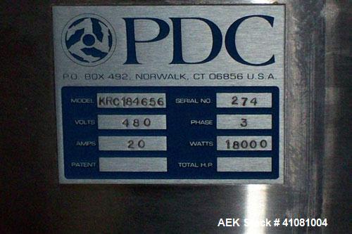 Used PDC Heat Tunnel For Temper Evident Bands, Model KRC184656. 3/480 volt, 20 amps, 18,000 watts, 46" long heat tunnel, (12) top mounted fans, manual raise and lower, Athena digital temperature cont...