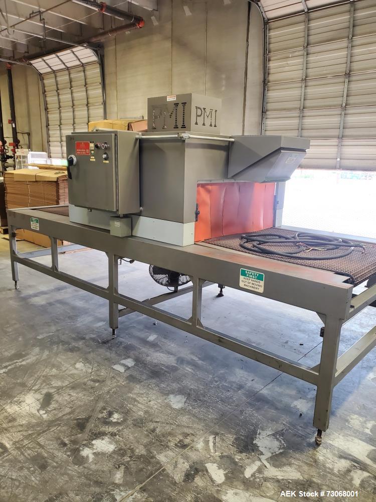 Used- PMI Model ST-601 Large Frame Shrink Tunnel. Chamber height: 18" x Width: 48". Conveyor width: 41-1/2", conveyor height...