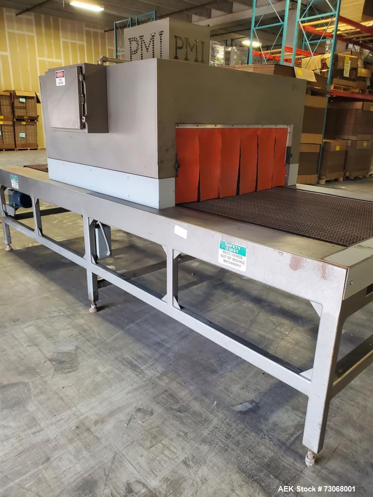 Used- PMI Model ST-601 Large Frame Shrink Tunnel. Chamber height: 18" x Width: 48". Conveyor width: 41-1/2", conveyor height...