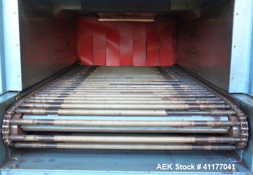 Used Rennco Shrink Tunnel, Model 1022, . Tunnel measures 22" wide x 10 3/4" tall x 36" long. Belt measures approximately 22" wide x 46" long. Driven by a 1/8 hp, 90 volt, 61 rpm DC motor. Manually ad...