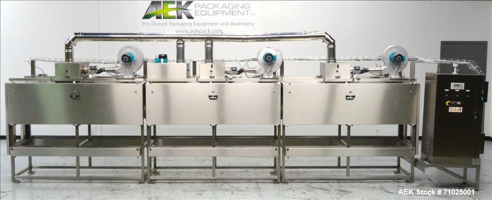 Used Sacmi Sleeve Labeling Electric Heat Tunnel. Has 3 zones, each zone has 72" long x 4.75" tall heater bars, and in/out feed opening of 9.5" wide x 33" tall. Equipped with (3) Leister electric heat...