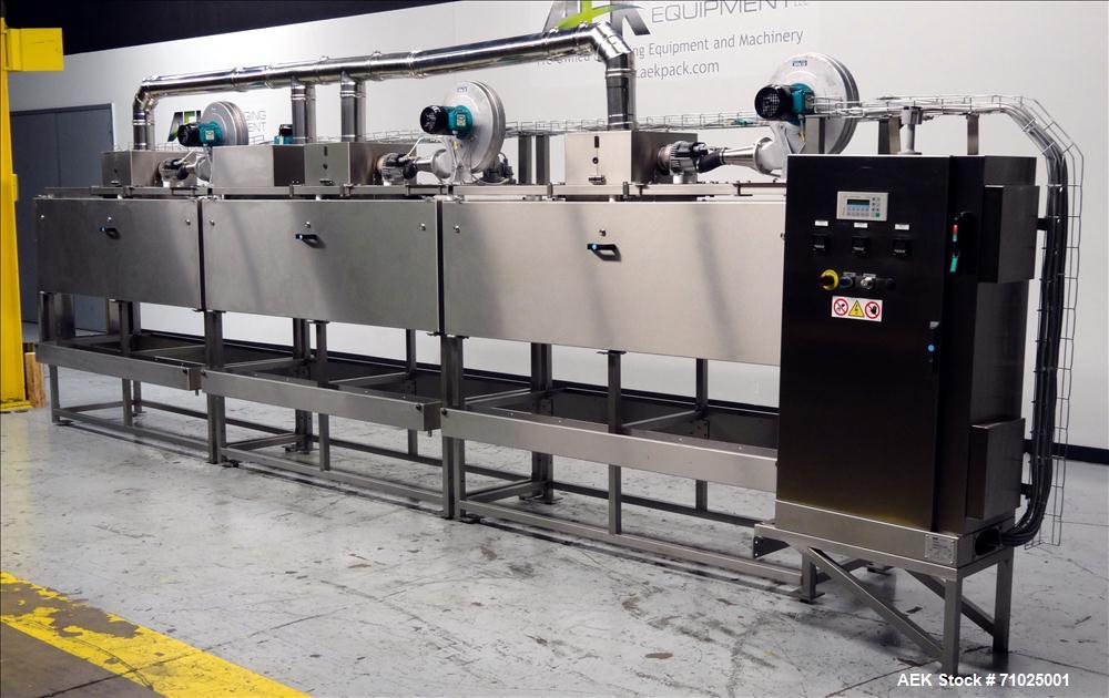 Used Sacmi Sleeve Labeling Electric Heat Tunnel. Has 3 zones, each zone has 72" long x 4.75" tall heater bars, and in/out feed opening of 9.5" wide x 33" tall. Equipped with (3) Leister electric heat...