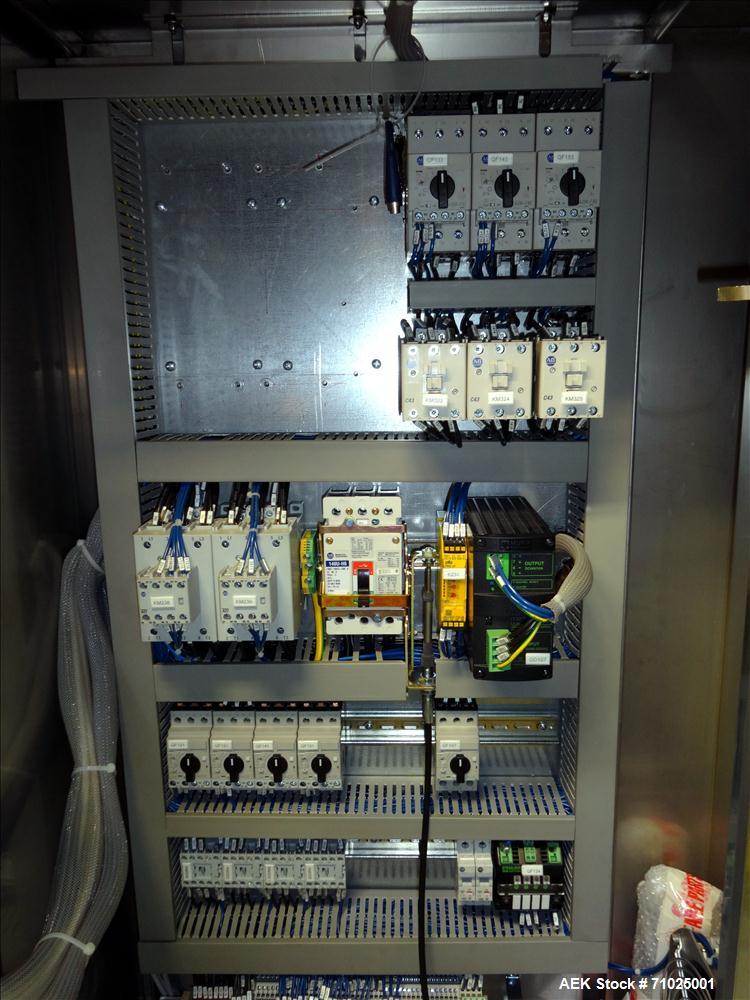 Used Sacmi Sleeve Labeling Electric Heat Tunnel. Has 3 zones, each zone has 72" long x 4.75" tall heater bars, and in/out feed opening of 9.5" wide x 33" tall. Equipped with (3) Leister electric heat...