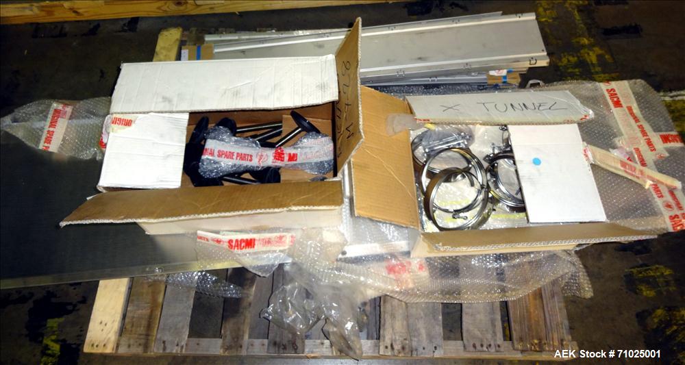 Used Sacmi Sleeve Labeling Electric Heat Tunnel. Has 3 zones, each zone has 72" long x 4.75" tall heater bars, and in/out feed opening of 9.5" wide x 33" tall. Equipped with (3) Leister electric heat...