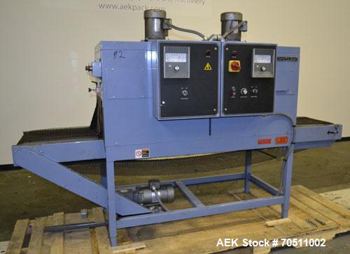 Used Shanklin Dual Zone Shrink Tunnel, Model CT62, Carbon Steel.  Tunnel passage 10" high x 18" wide x 61" long. 14" Wide x 100" long wire mesh conveyor, speeds variable from 25 to 150 feet a minute,...