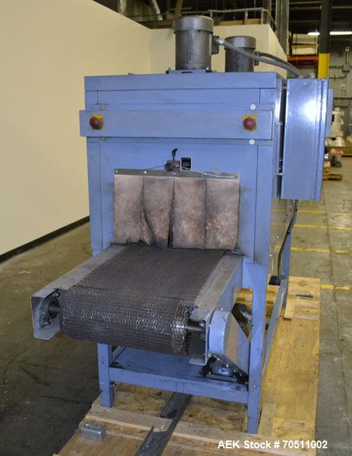 Used Shanklin Dual Zone Shrink Tunnel, Model CT62, Carbon Steel.  Tunnel passage 10" high x 18" wide x 61" long. 14" Wide x 100" long wire mesh conveyor, speeds variable from 25 to 150 feet a minute,...