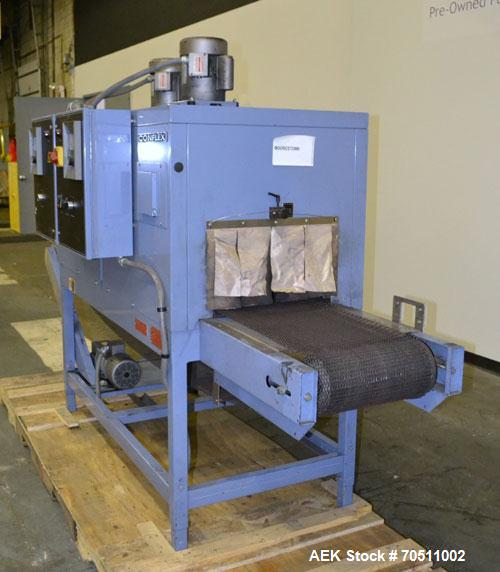 Used Shanklin Dual Zone Shrink Tunnel, Model CT62, Carbon Steel.  Tunnel passage 10" high x 18" wide x 61" long. 14" Wide x 100" long wire mesh conveyor, speeds variable from 25 to 150 feet a minute,...