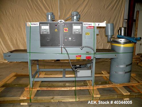 Used Shanklin Dual Chamber Heat Shrink Tunnel, Model  T-62, Carbon steel. Dual chamber high speed unit capable of speeds from 25 to 150 FPM. Chamber size 10" high x 18" wide x 61" long. Mesh chain co...