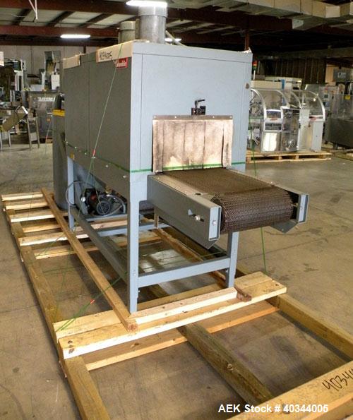 Used Shanklin Dual Chamber Heat Shrink Tunnel, Model  T-62, Carbon steel. Dual chamber high speed unit capable of speeds from 25 to 150 FPM. Chamber size 10" high x 18" wide x 61" long. Mesh chain co...