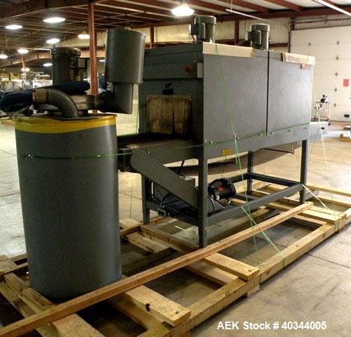 Used Shanklin Dual Chamber Heat Shrink Tunnel, Model  T-62, Carbon steel. Dual chamber high speed unit capable of speeds from 25 to 150 FPM. Chamber size 10" high x 18" wide x 61" long. Mesh chain co...