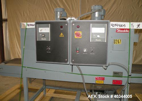Used Shanklin Dual Chamber Heat Shrink Tunnel, Model  T-62, Carbon steel. Dual chamber high speed unit capable of speeds from 25 to 150 FPM. Chamber size 10" high x 18" wide x 61" long. Mesh chain co...