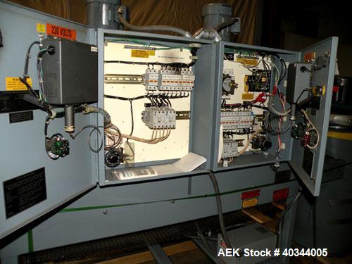 Used Shanklin Dual Chamber Heat Shrink Tunnel, Model  T-62, Carbon steel. Dual chamber high speed unit capable of speeds from 25 to 150 FPM. Chamber size 10" high x 18" wide x 61" long. Mesh chain co...