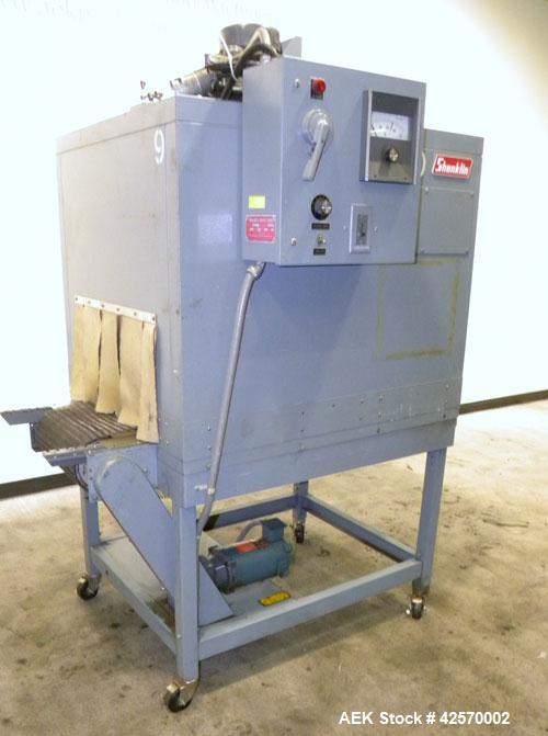 Used Shanklin Shrink Tunnel Model T-7XL. Machine is of carbon steel construction. Tunnel passage 8" high x 22" wide x 42" long. 15" Wide x 52" long wire mesh conveyor, 15 to 120 feet per minute. Driv...