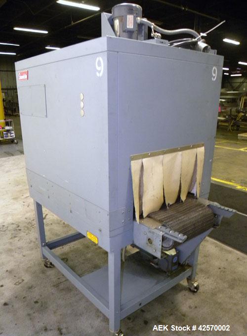 Used Shanklin Shrink Tunnel Model T-7XL. Machine is of carbon steel construction. Tunnel passage 8" high x 22" wide x 42" long. 15" Wide x 52" long wire mesh conveyor, 15 to 120 feet per minute. Driv...