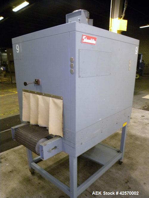 Used Shanklin Shrink Tunnel Model T-7XL. Machine is of carbon steel construction. Tunnel passage 8" high x 22" wide x 42" long. 15" Wide x 52" long wire mesh conveyor, 15 to 120 feet per minute. Driv...