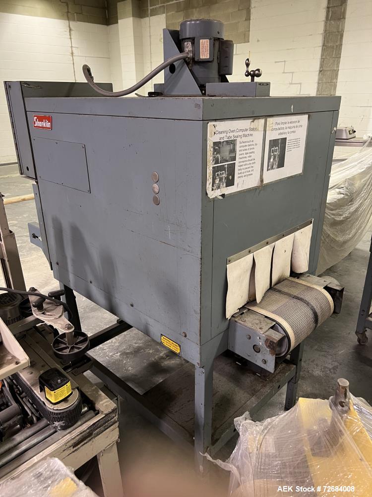 Used Shanklin T-7XL Shrink Tunnel. Serial# T-8953. Belt 14" wide x 74" long, speed approximate variable 15 feet/minute to 120 feet/minute, temperature range approximate 50 - 500 degrees F. 230V, 1 ph...