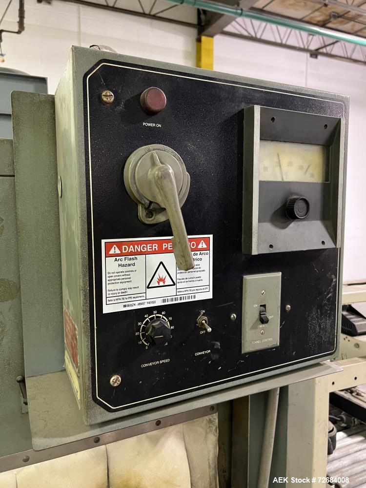 Used Shanklin T-7XL Shrink Tunnel. Serial# T-8953. Belt 14" wide x 74" long, speed approximate variable 15 feet/minute to 120 feet/minute, temperature range approximate 50 - 500 degrees F. 230V, 1 ph...