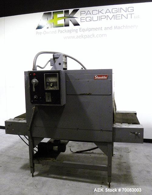 Used Shanklin High Capacity Shrink bundler Tunnel, Model T-8, Carbon Steel. Tunnel passage 12" high x 28" wide. Wire mesh belt 24'' wide x 76'' long, 0 to 74 feet per minute, driven by a 1/2 hp, 180 ...