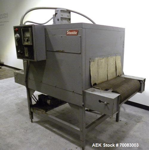 Used Shanklin High Capacity Shrink bundler Tunnel, Model T-8, Carbon Steel. Tunnel passage 12" high x 28" wide. Wire mesh belt 24'' wide x 76'' long, 0 to 74 feet per minute, driven by a 1/2 hp, 180 ...