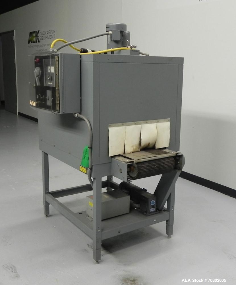 Used Shanklin Model T-7XL Single Zone Heat Shrink Tunnel. Tunnel conveyor is rated at speeds from 15 to 120 ft per minute. Has temperature controls from 50 to 500 deg. F. Has a 4-8" high (adjustable)...