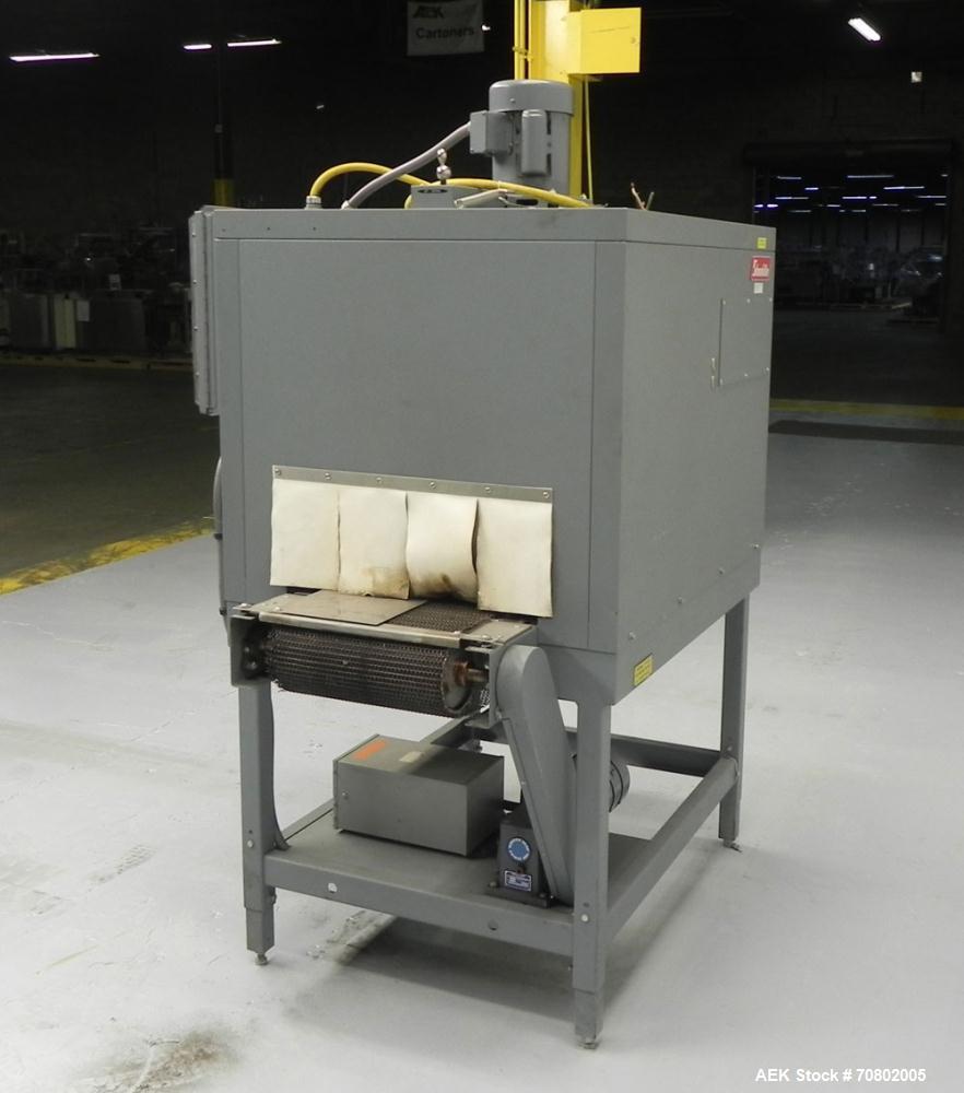 Used Shanklin Model T-7XL Single Zone Heat Shrink Tunnel. Tunnel conveyor is rated at speeds from 15 to 120 ft per minute. Has temperature controls from 50 to 500 deg. F. Has a 4-8" high (adjustable)...