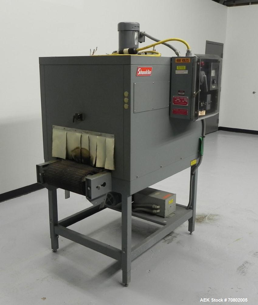 Used Shanklin Model T-7XL Single Zone Heat Shrink Tunnel. Tunnel conveyor is rated at speeds from 15 to 120 ft per minute. Has temperature controls from 50 to 500 deg. F. Has a 4-8" high (adjustable)...