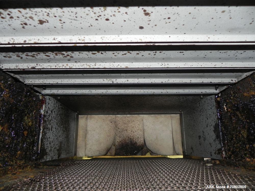 Used Shanklin Model T-7XL Single Zone Heat Shrink Tunnel. Tunnel conveyor is rated at speeds from 15 to 120 ft per minute. Has temperature controls from 50 to 500 deg. F. Has a 4-8" high (adjustable)...