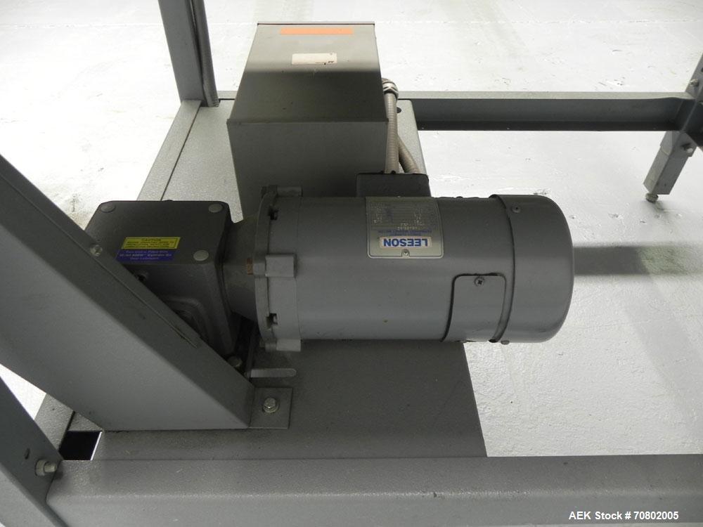 Used Shanklin Model T-7XL Single Zone Heat Shrink Tunnel. Tunnel conveyor is rated at speeds from 15 to 120 ft per minute. Has temperature controls from 50 to 500 deg. F. Has a 4-8" high (adjustable)...