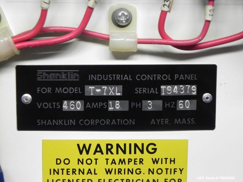 Used Shanklin Model T-7XL Single Zone Heat Shrink Tunnel. Tunnel conveyor is rated at speeds from 15 to 120 ft per minute. Has temperature controls from 50 to 500 deg. F. Has a 4-8" high (adjustable)...