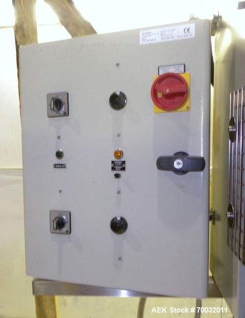 Used Sleevit Model 750 Shrink Tunnel. (4) Nozzles and 2 temperature zones. Tunnel 3/50/415 18A.Tunnel opening is 15" High x 6" Wide,with an adjustable gate now reducing opening to 5" high. The intern...