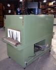 Used Signature Packaging 2412-TM Shrink Tunnel. Dual chamber shrink tunnel with twin blowers, mesh belt and variable speed 7' long x 16