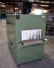 Used Signature Packaging 2412-TM Shrink Tunnel. Dual chamber shrink tunnel with twin blowers, mesh belt and variable speed 7' long x 16